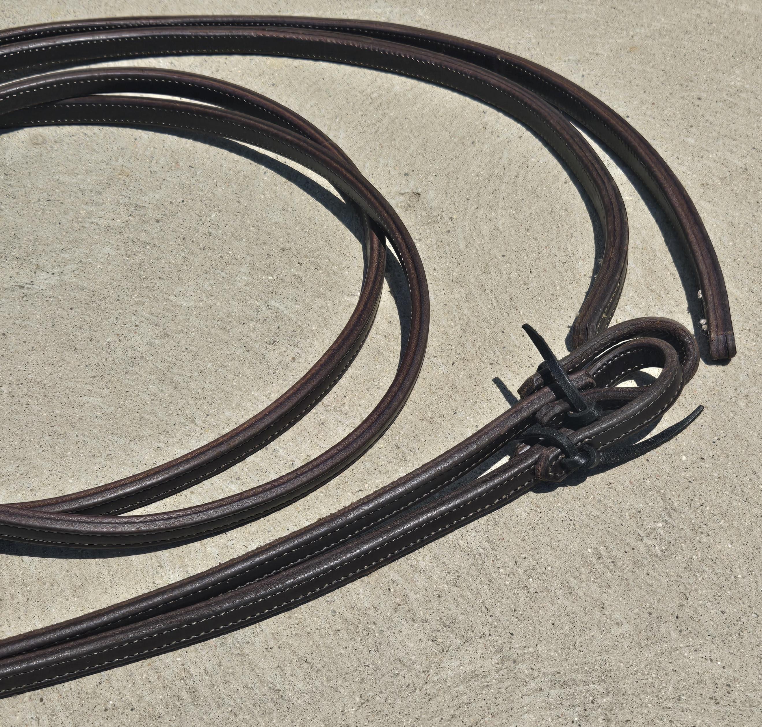 Split reins, dark oil, stitched with weighted ends, 8ft, 5/8"