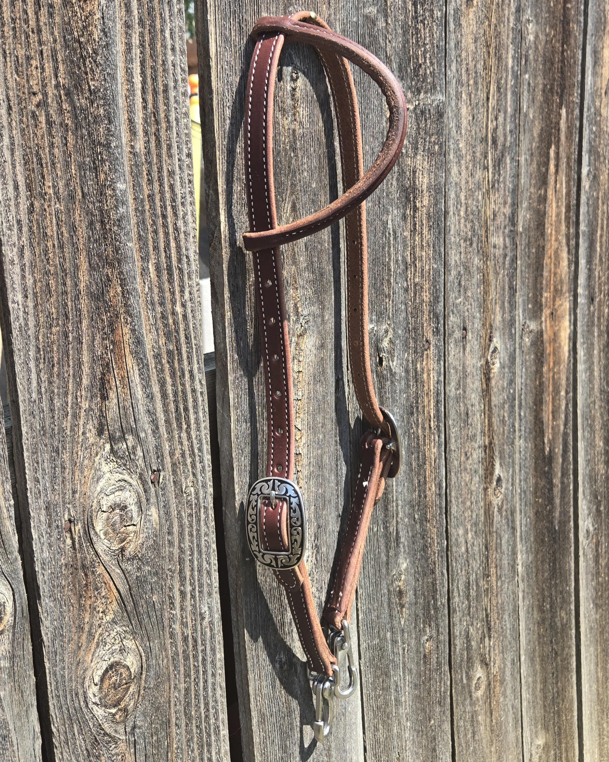 One ear headstall with quick change snap ends, butter soft leather, stainless steel hardware, standard horse size